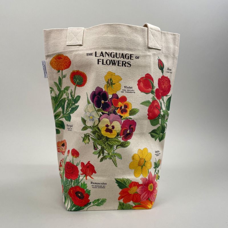 Indkøbsnet med motiv af forskellige blomster og deres symbolske betydning 1