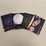 Sæt med 4 små notesbøger med forskellige astronomi motiver. small 2